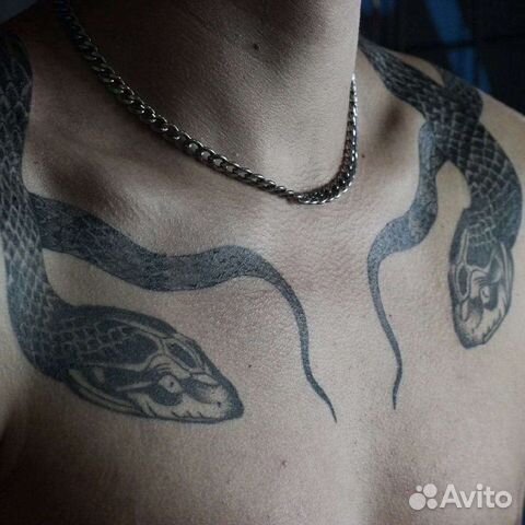 Мастер татуировки