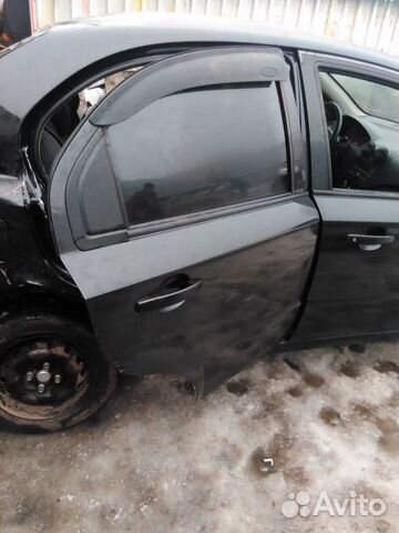 Стекло задней правой двери Шевроле Авео T200 GM