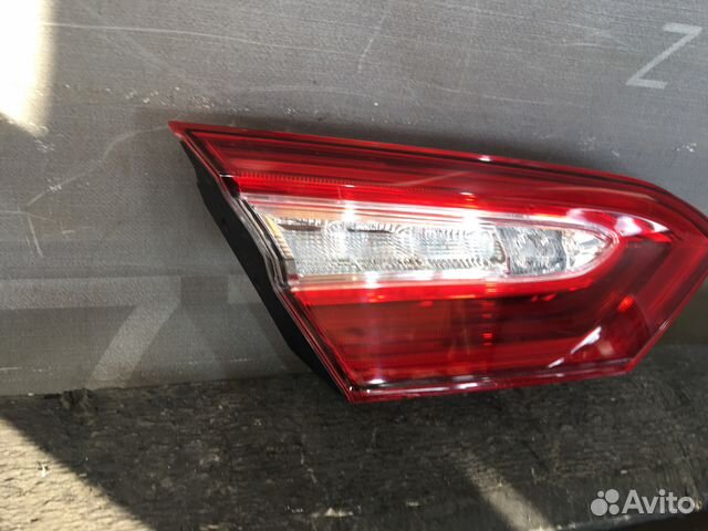 Фонарь левый Toyota Camry 70 б/у оригинал
