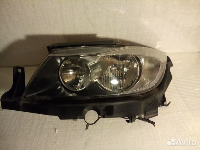 Фара левая BMW 3 e90 04-08