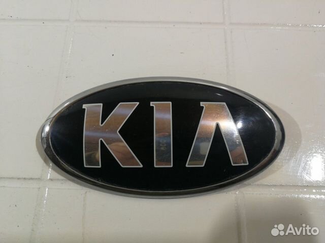 Знак / эмблема передний Kia Cerato 3 Дорестайлинг Знак / эмблема передний Kia Cerato 3 Дорестайлинг