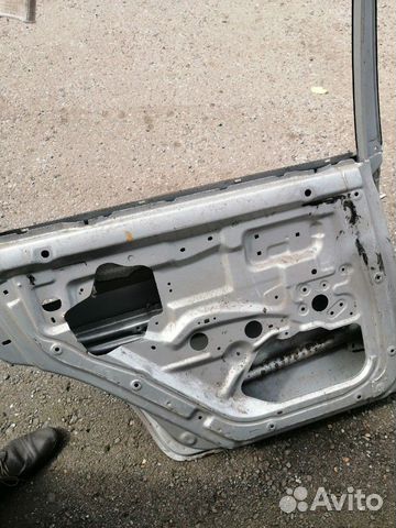 Дверь задняя левая Kia Spectra, б/у серебро