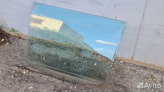 Стекло задней левой двери Октавия тур универсал