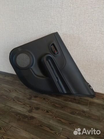 Обшивка двери Тойота Аква