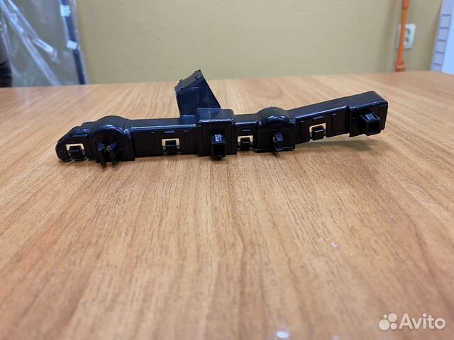 Кронштейн бампера передний левый на Nissan