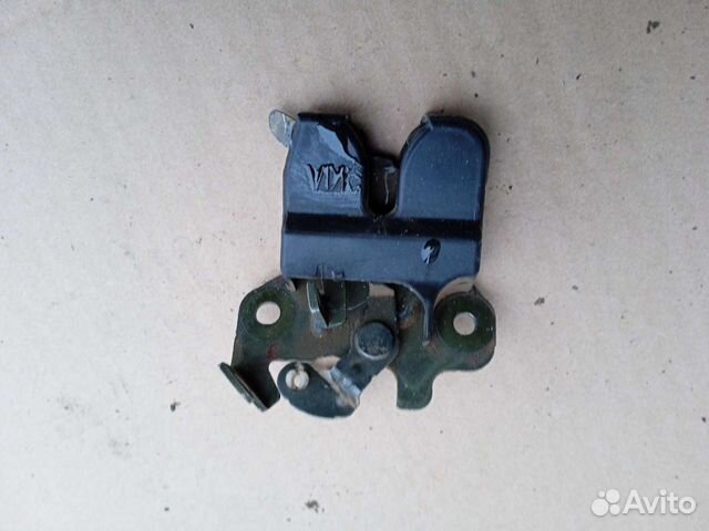 Замок багажника Киа Спектра