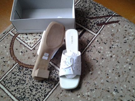 Продаю новые кожаные босоножки белого цвета