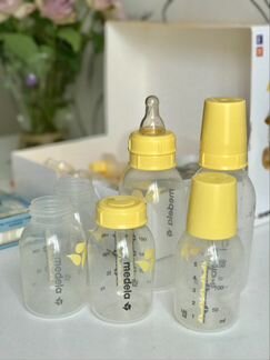 Молокоотсос Medela электрический + бутылочки