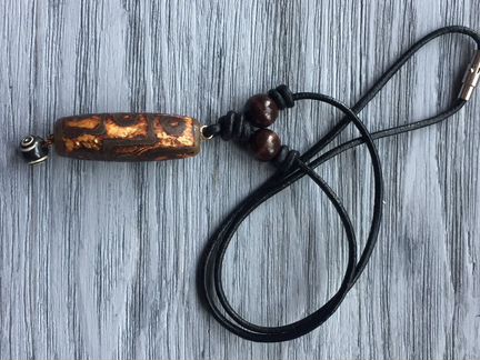 Бусина дзи 9 глаз - самая сильная и популярная на