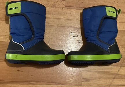 Непромокаемые синие детские сапоги crocs размер C7