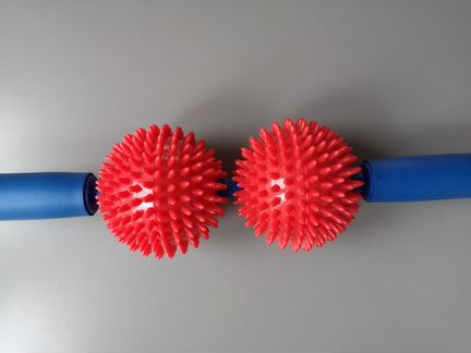 Роликовый массажер для спины