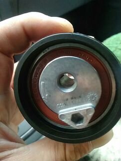 Натяжитель ремня грм GM 12625560